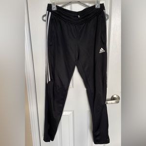 Adidas track pants.